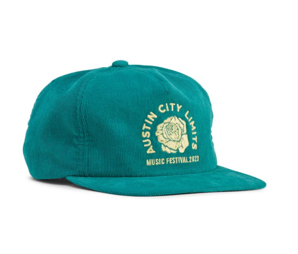 a green corduroy hat with a white Austin City Limis logo